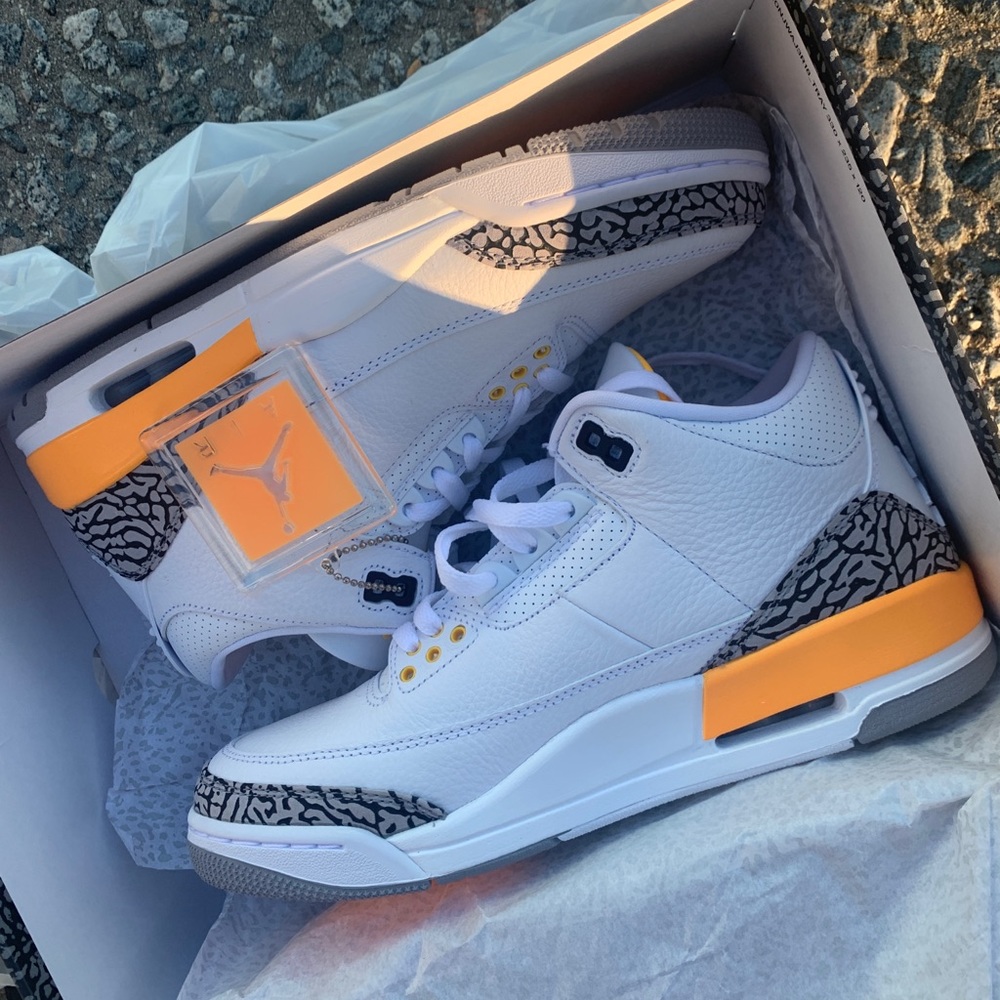 Jordan laser orange threes .